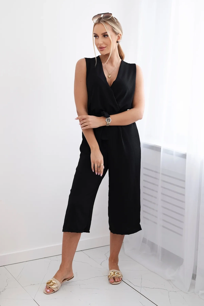 Black jumpsuit tied at the waist with straps